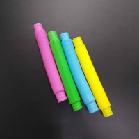 Розвиваюча сенсорна дитяча іграшка Pop Tube антистрес поп туб набір 4 шт POP-TB-28 (жовтий, рожевий, блакитний, зелений)