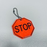 Світловідбиваючий брелок "Stop" Stenson 38443-1 помарачевий